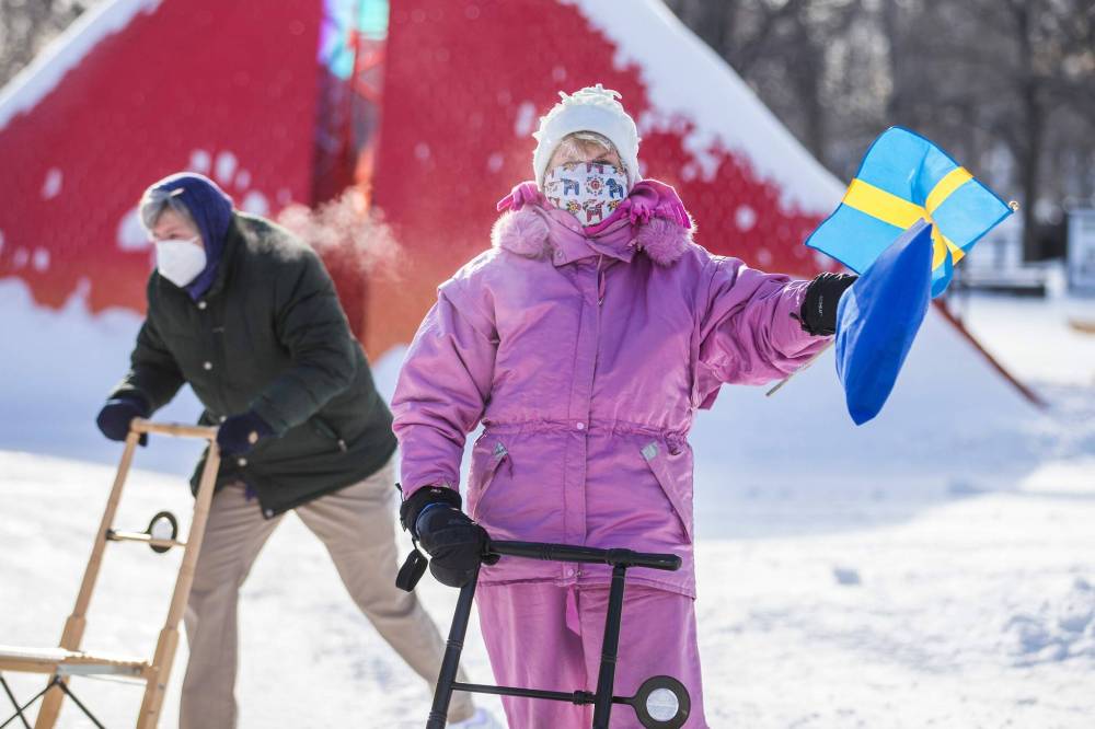 Sonja Lundstrom, president of the Swedish Cultural Association of Manitoba, is excited to try a modern kicksled. (Mikaela MacKenzie / Winnipeg Free Press)