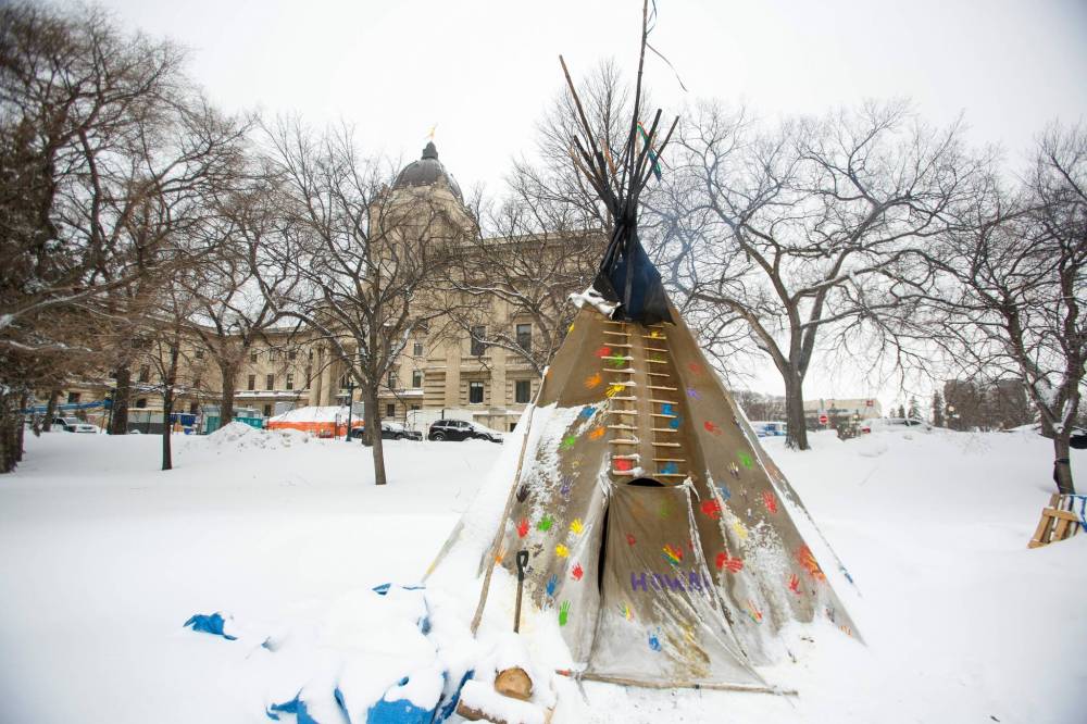 Organizers have vowed the sacred fire will burn until all the graves of children who died in residential schools have been found. (Mike Deal / Winnipeg Free Press)