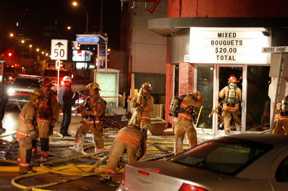 BORIS MINKEVICH / WINNIPEG FREE PRESS 090315 Fire scene at Roy’s Florist at 710 Notre Dame Ave. right across the street from HSC Women’s Hospital.