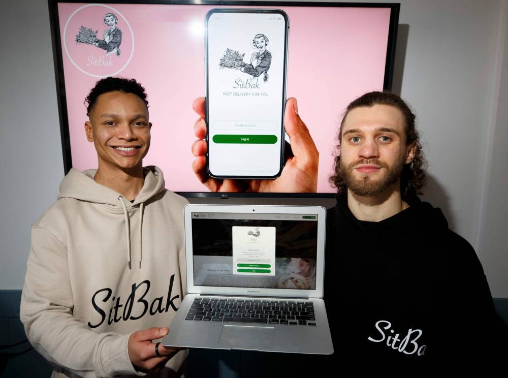 Connor Bowey (left) and Dustin Roitelman are launching SitBak, an app that will offer home delivery of cannabis products. (Mike Deal / Winnipeg Free Press)