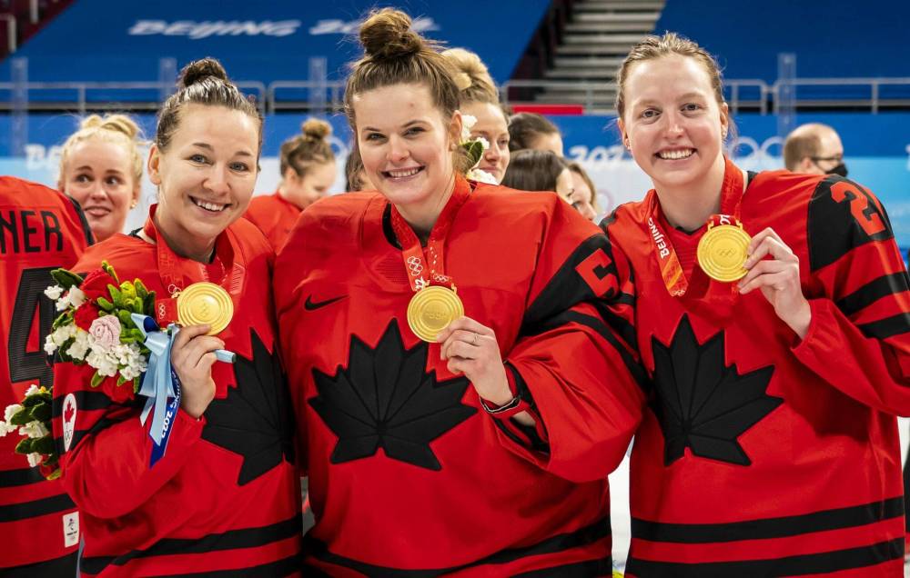 SUPPLIED
Manitobans Jocelyne Larocque, Kristen Campbell and Ashton Bell show off their Olympic gold medals after Team Canada beat the US in the final in Beijing.