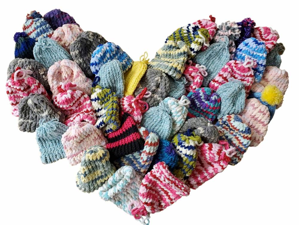 The donated knit hats keep the babies warm but are also a keepsake for parents, including those navigating the heartbreak of perinatal loss.(Supplied)
