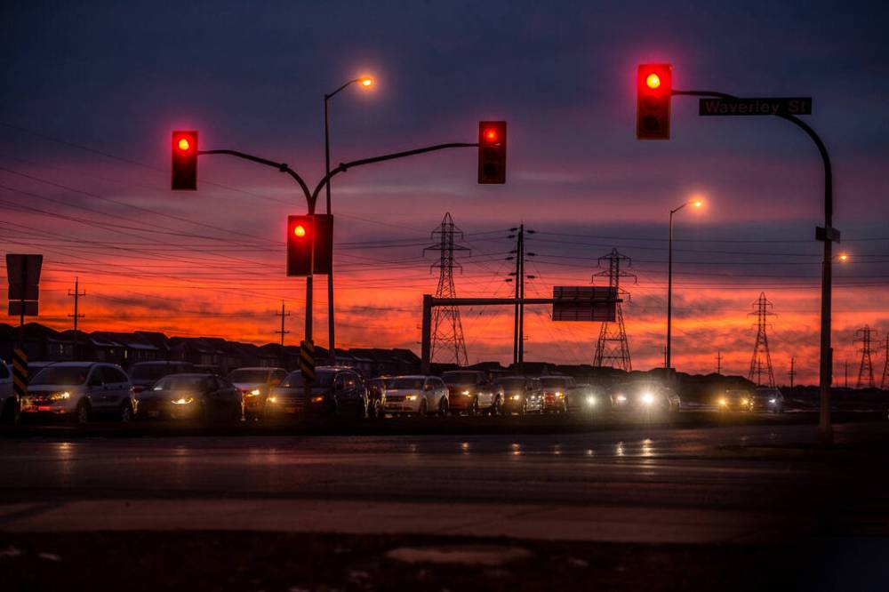 Rush hour traffic sits at a red light on Bishop Grandin Boulevard. (Mike Sudoma / Free Press files)