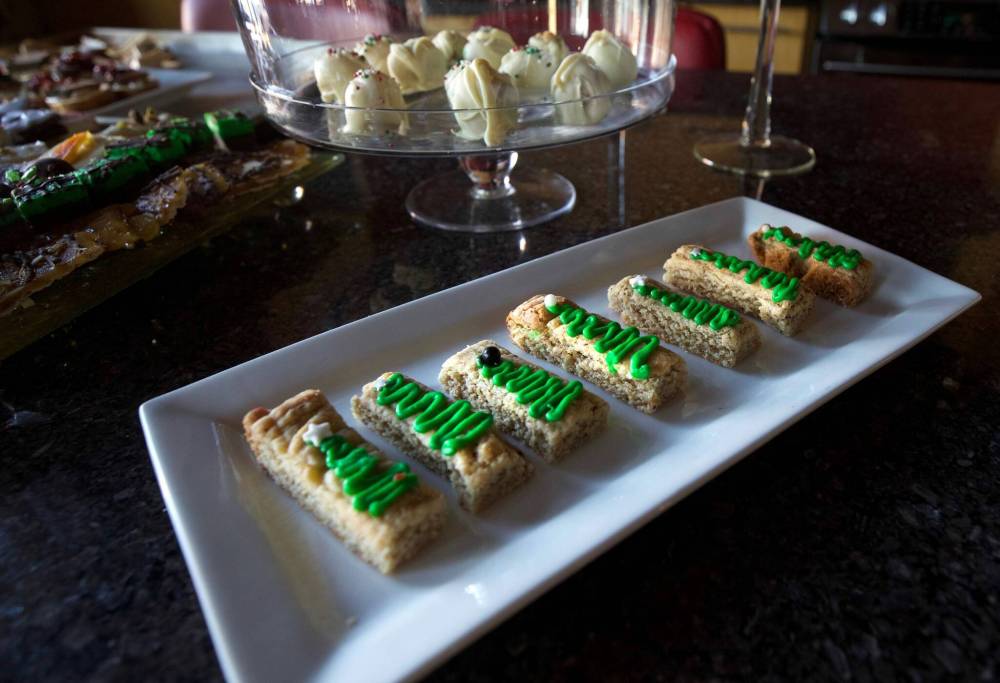 RUTH BONNEVILLE / WINNIPEG FREE PRESS ENT cookie photo Doris Mae Oulton at home with a tray of her Lemon, hazelnut, shortbread Christmas Cookies. Doris Mae Oulton, and she’s been a lifelong community activist, especially for women’s issues. She was an assistant deputy minister for some time, and earlier this year, she was named to the Order of Manitoba. She remains the chair of the Nellie McClung Foundation. Despite all the accomplishments, she’s just as proud of her baking at this time of year. See Alan’s story. Dec 14th, 2021