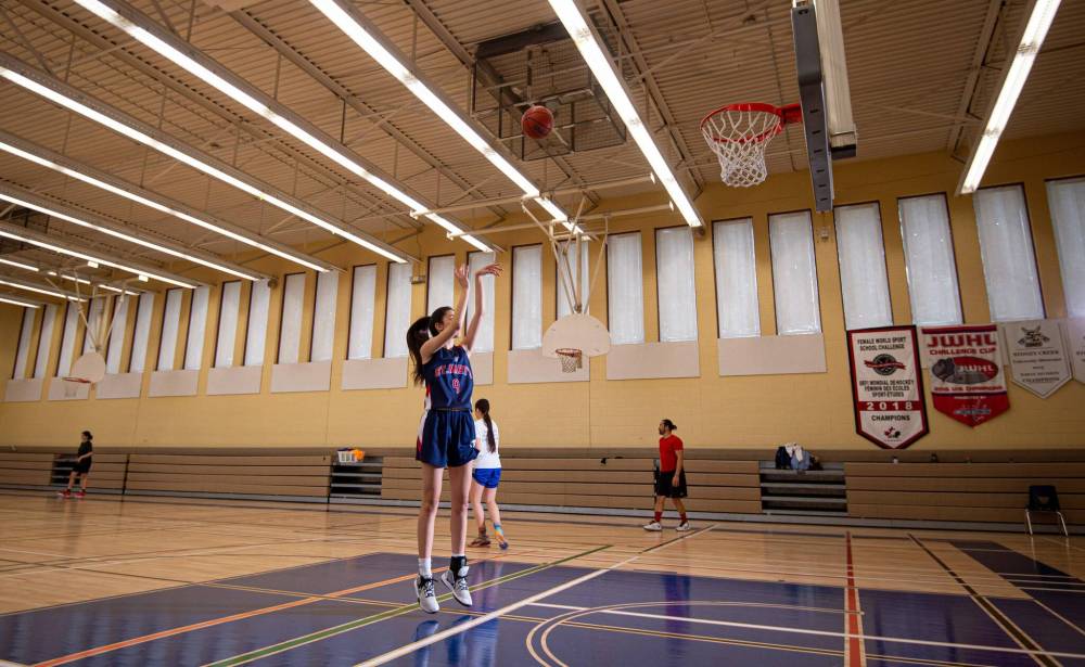 MIKE SUDOMA / WINNIPEG FREE PRESS
“When I do move on to university, I plan to play the stretch forward position — playing in the mid range but also being able to pop out on the outside and attack hard and shoot from there,” said Emilia Banmann.
Mike Sudoma / Winnipeg Free Press St Mary Flames guard, Emilia Banmann takes a jump shot during practice at St Mary’s Academy Tuesday evening. March 15, 2022