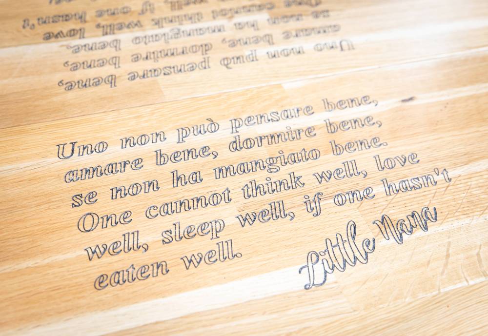 JESSICA LEE / WINNIPEG FREE PRESS
A wood engraving on a table adds some charm.