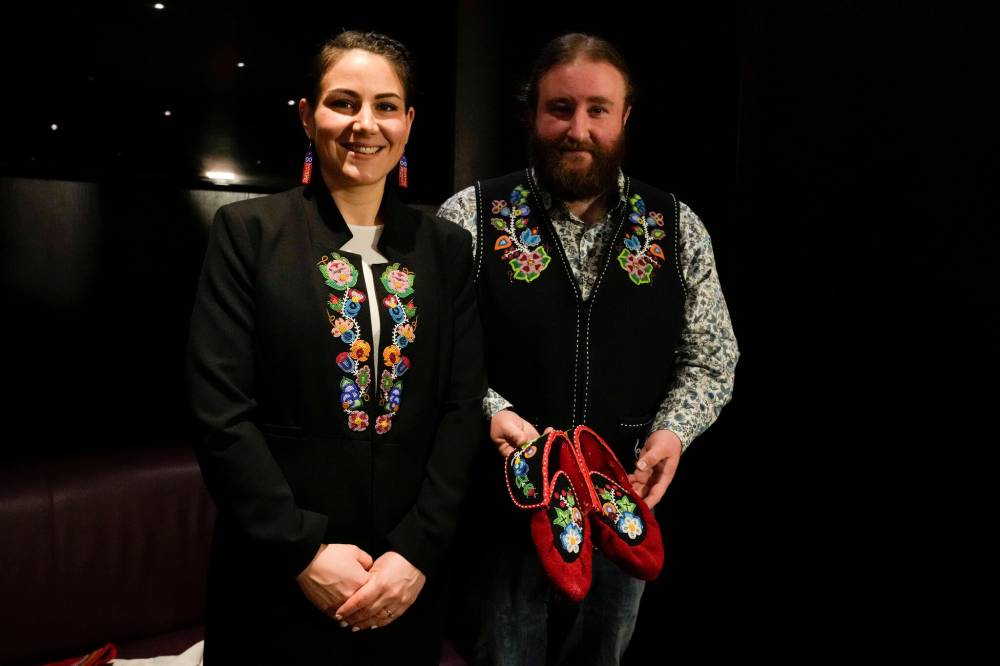 GREGORIO BORGIA / ASSOCIATED PRESS PHOTO
Mitchell Case, Community-based historian and educator, and Region 4 Councillor, Metis Nation of Ontario, right, and the President of the Metis community, Cassidy Caron, showing a pair of traditional Metis pointed-toe style moccasin as a gift to Pope Francis in Rome.