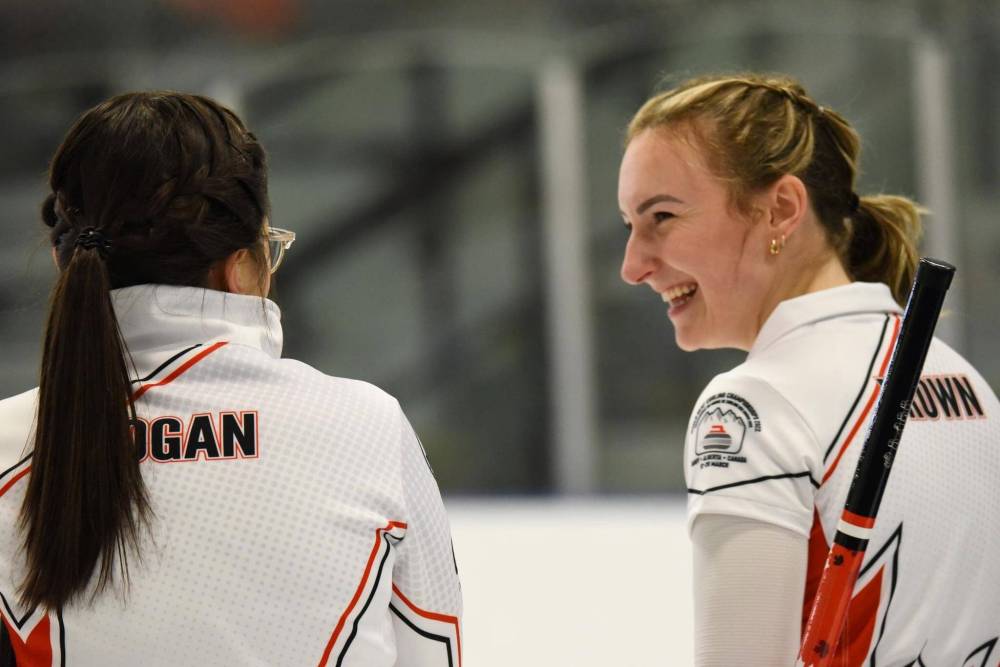 Skip Emma Logan (from left) and second Hannah Brown share a laugh during their game against Team USA. (Supplied)