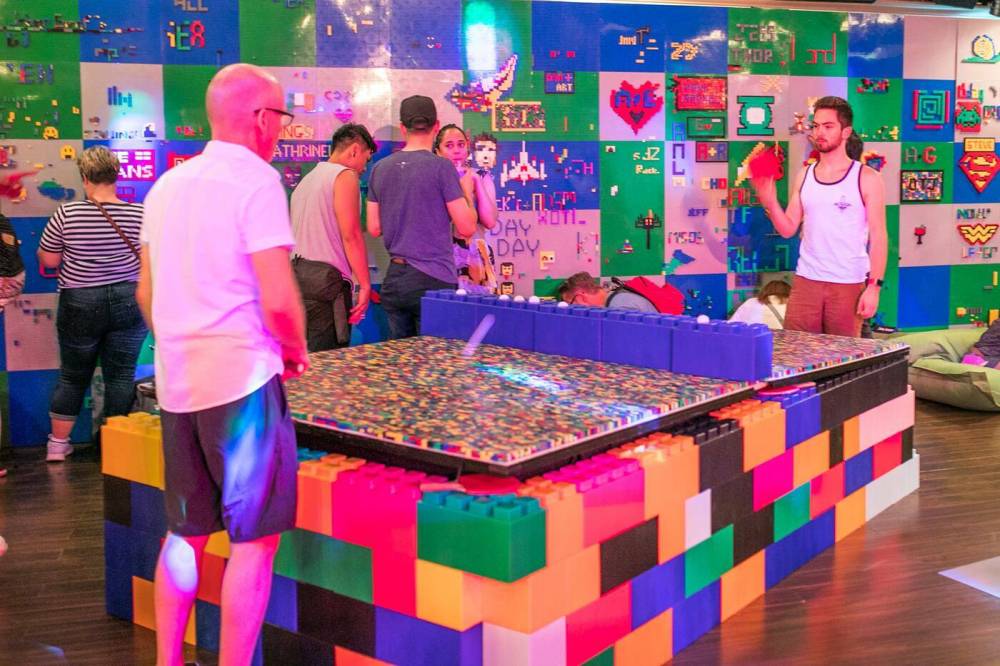 SUPPLIED PHOTOCustomers get 90 minutes to play around with the blocks — sticking them to walls, piecing them together, playing ping pong on a table made with over 22,000 of the small bricks.