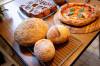 A sampling of Jared Ozuk’s creations including pizza, dinner rolls and cinnamon buns.