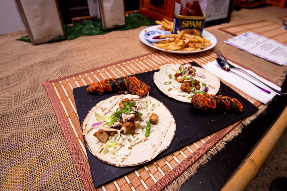 Mike Sudoma / Winnipeg Free Press
Sisig taco and mochiko chicken are the creations of chef Eejay Chua.