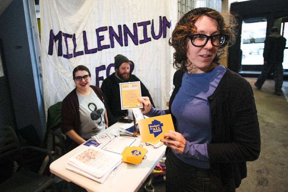 DANIEL CRUMP / WINNIPEG FREE PRESS FILES
“It’s taking the job away from security and policing and instead building this welcome community space,” said Joe Curnow (right), a member of Millennium for All.