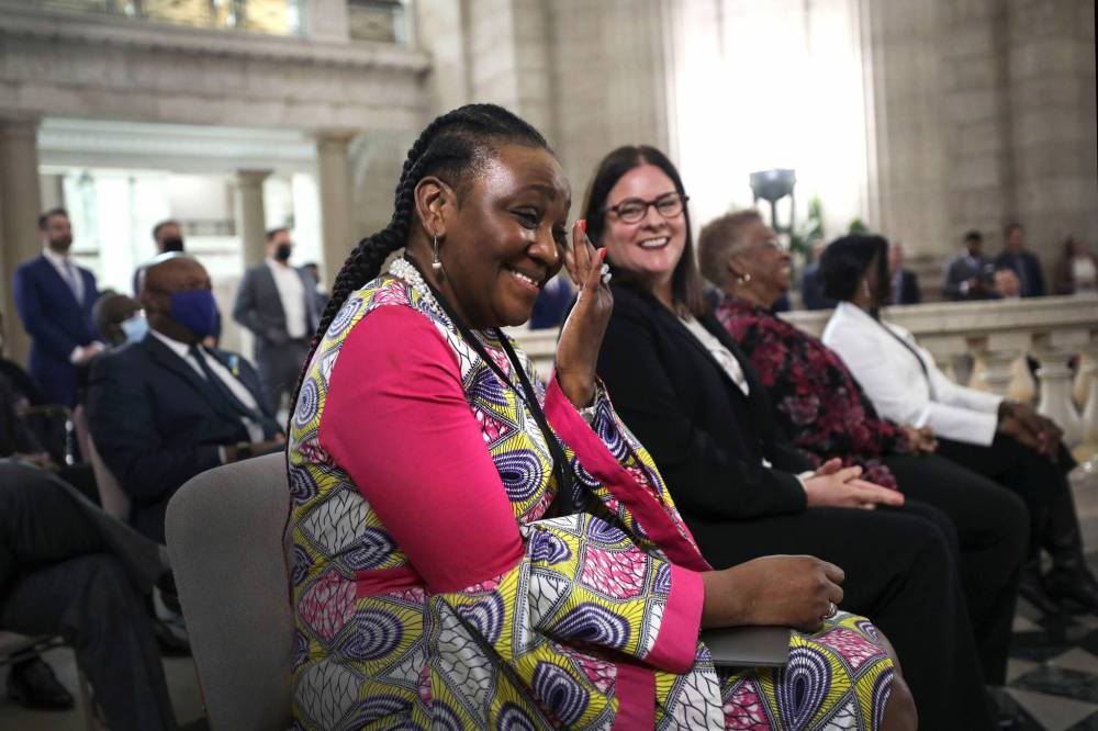 Premier Heather Stefanson (right) smiles at Dr Zita Somakoko at the launch of Black Manitobans Chamber of Commerce at the Legislative Building Wednesday. (Ruth Bonneville / Winnipeg Free Press)