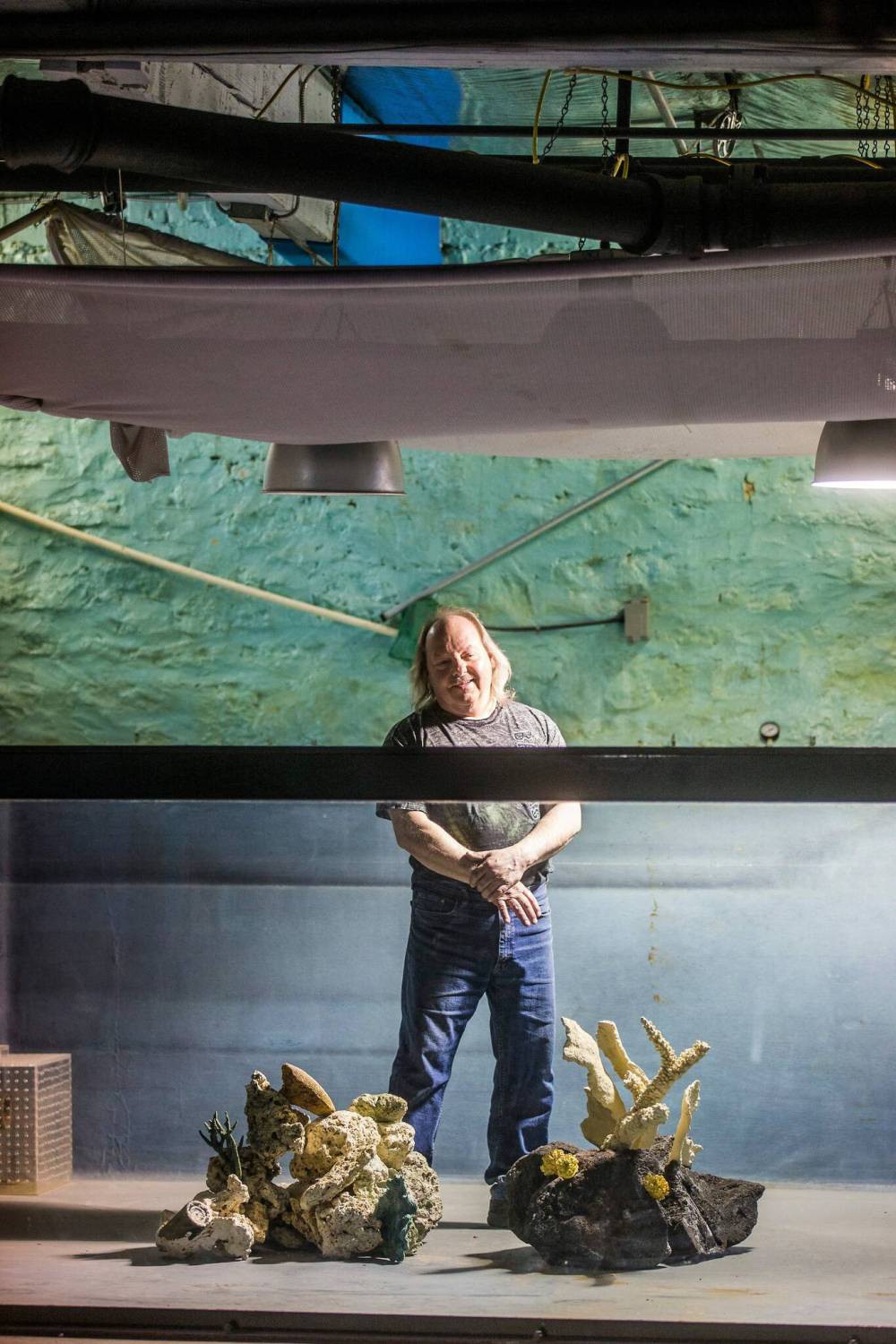 MIKAELA MACKENZIE / WINNIPEG FREE PRESS
Banack stands in an empty 5,000-gallon tank in his shop on McDermot Avenue.