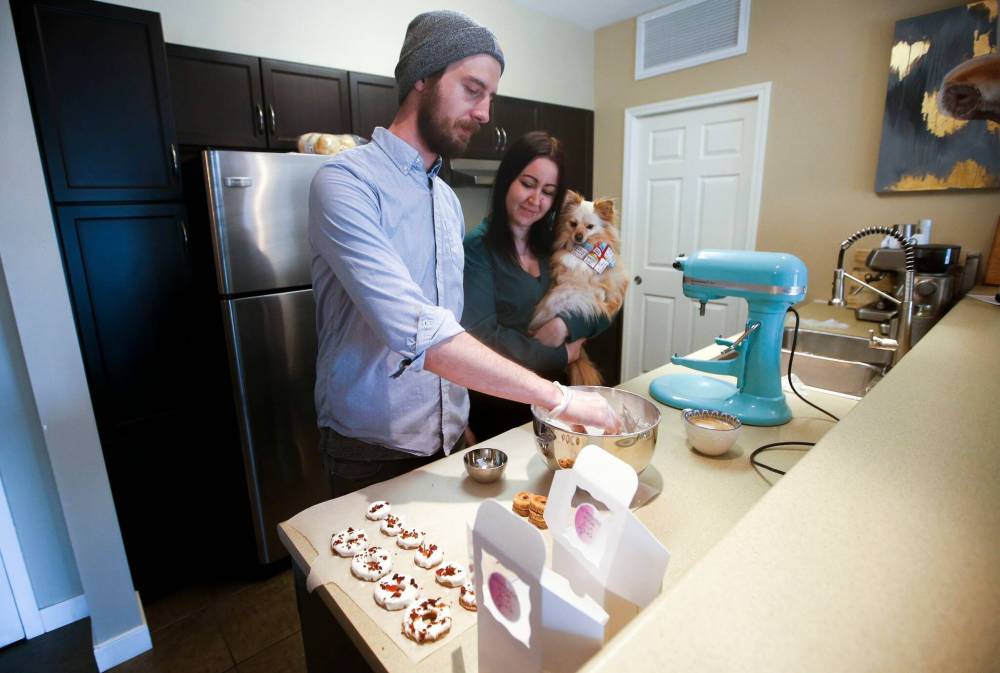 JOHN WOODS / WINNIPEG FREE PRESS
Unless they have a scheduled sale to attend, in which case they’ll spend a few days building up stock, every last doughnut of theirs is made fresh to order.