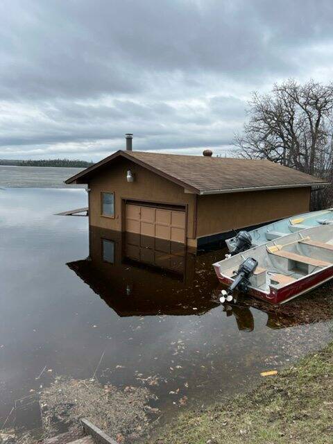 Donna Hastings photo
A boathouse is partially submerged at Windsock Lodge on Long Lake in Nopiming Provincial Park.