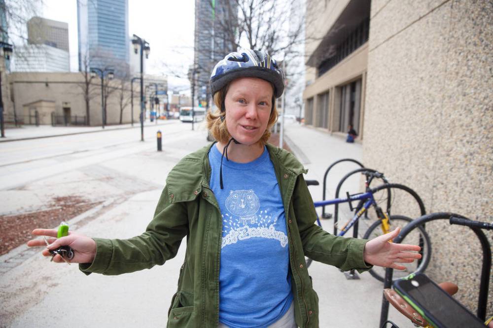MIKE DEAL / WINNIPEG FREE PRESS
Library user Mona Neufeld outside the Millennial Library gives their thoughts about how the city is doing regarding Library services Friday afternoon.