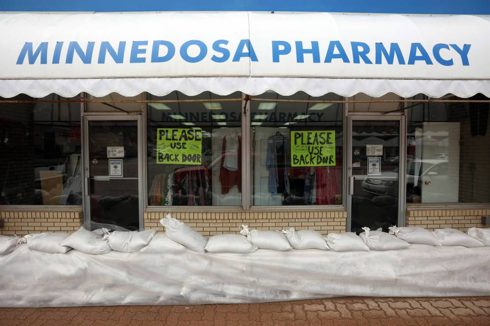 At Minnedosa Pharmacy, three pumps are running 24 hours a day to get rid of water seeping in through the ground. (Tim Smith / The Brandon Sun)