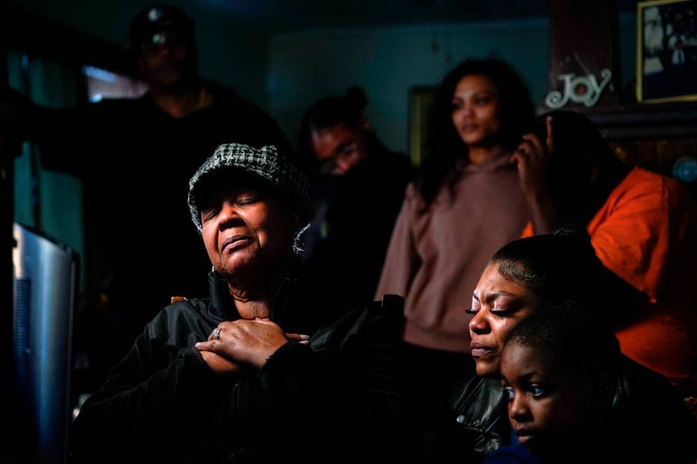 MATT ROURKE / THE ASSOCIATED PRESS FILESFamily members speak with The Associated Press about Celestine Chaney who was killed in the shooting.