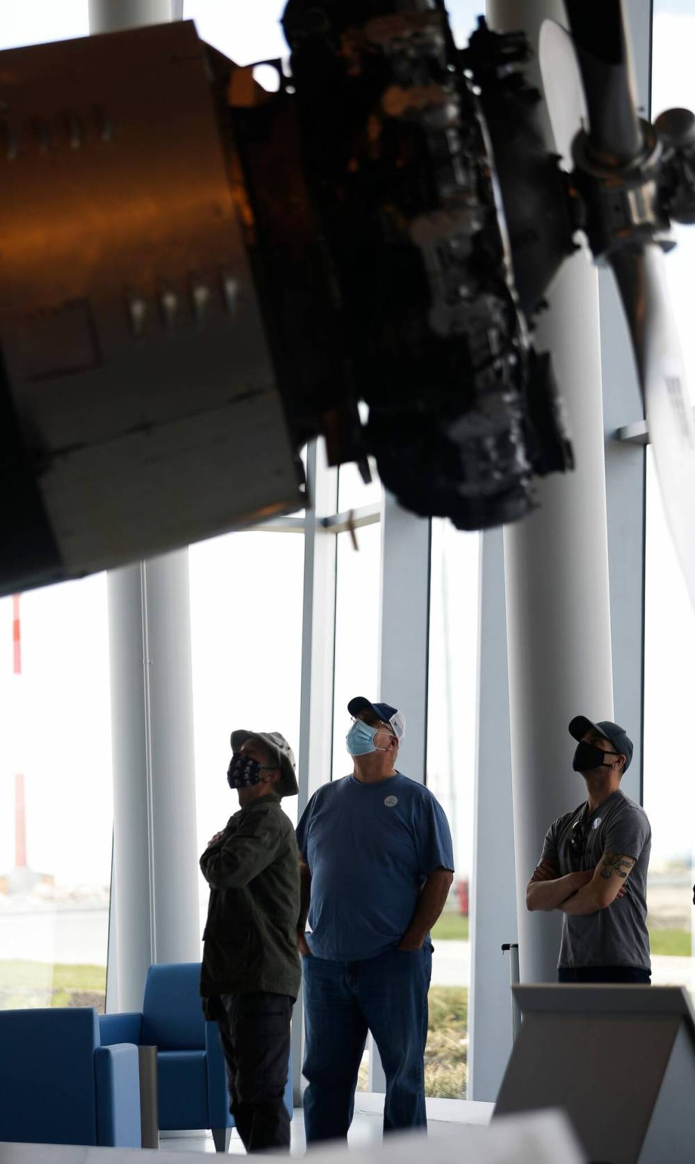 Visitors (left) view some of the historic aircraft in the RAMWC on display in the new $43-million facility on the campus of Winnipeg
Richardson International Airport during its opening weekend. Construction began two years ago and a team of 135 volunteers are
involved in the grand opening. (John Woods / Winnipeg Free Press)