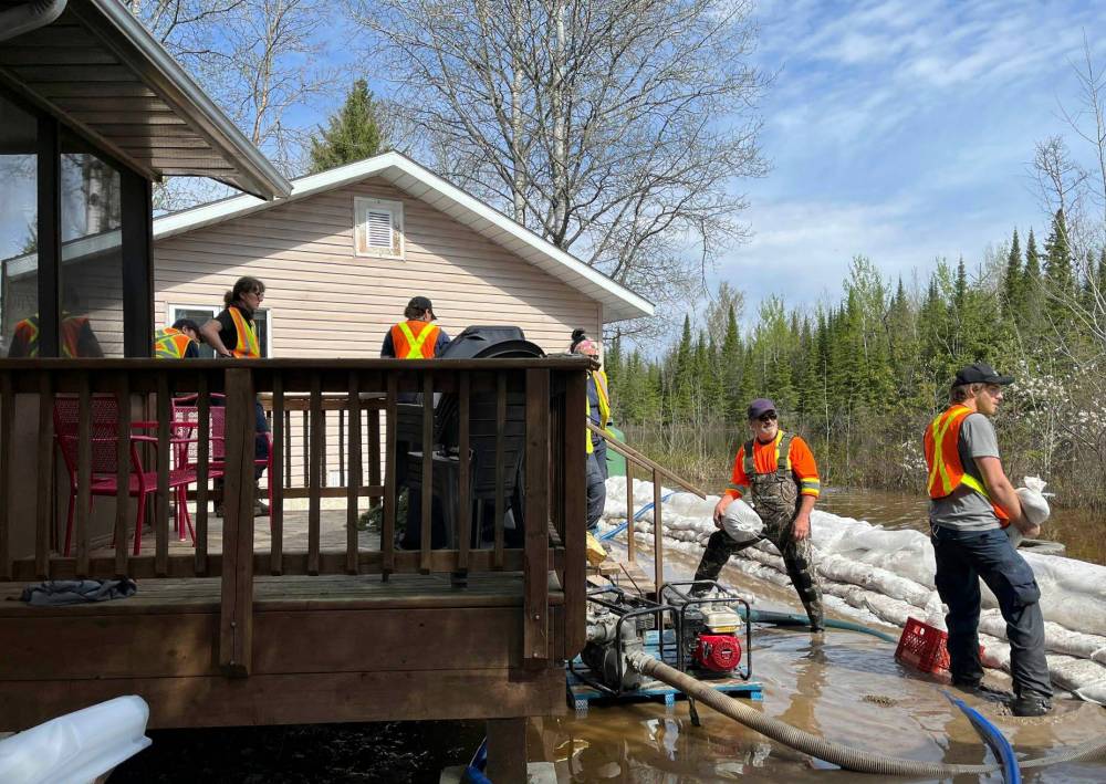Nutimik Lodge co-owner Allison Baker-Thiessen was grateful after the province sent about 50 members of the Manitoba Wildfire Program to help build dikes and set up water pumps. (Allison Baker-Thiessen Photo)
