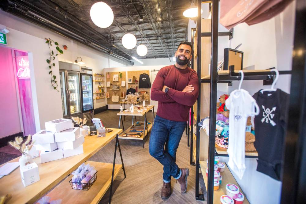 MIKAELA MACKENZIE / WINNIPEG FREE PRESS
Obby Khan, co-founder of GoodLocal, in the new storefront in the Exchange District.