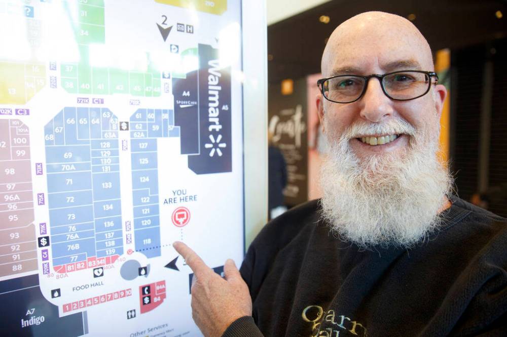 MIKE DEAL / WINNIPEG FREE PRESS Doug Touchette, in St. Vital Centre, has created an online version of the shopping mall, with Canadian-made products only. Doug Touchette created a virtual mall that sells Canadian-made products only. The Made in Canada Mall (madeincanadamall.ca) launched July 1 and has been averaging a few hundred “shoppers” a day, since then. What sets Touchette’s idea apart from other online directories and / or markets is that, at first glance, it looks exactly like a mall directory map you see at St. Vital Centre or wherever, indicating “you are here” and where the various stores are. It’s a mall footprint, made to look that way, as shoppers are familiar with that format. 211206 - Monday, December 06, 2021.