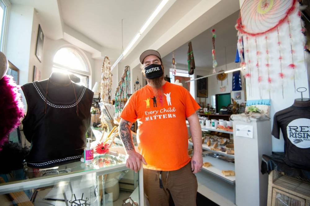 Mike Sudoma / Winnipeg Free Press Keith Proulx, Owner of Cree Ations and Artist Showcase, inside the front of his shop/workshop on Main St Monday afternoon December 13, 2021