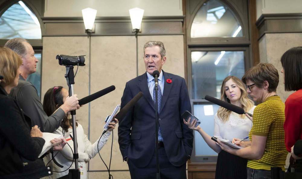 JUSTIN TANG / THE CANADIAN PRESS
The Manitoba government has taken out newspaper and electronic advertisements in Quebec that welcome civil servants to move to Manitoba if they feel threatened by Quebec's ban on religious symbols in the workplace.