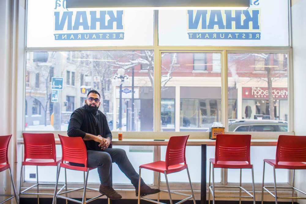 Obby Khan, owner of Shawarma Khan on McDermot Avenue, believes the city will heed business owners’ demands to reduce hourly parking rates. (Mikaela MacKenzie / Winnipeg Free Press)