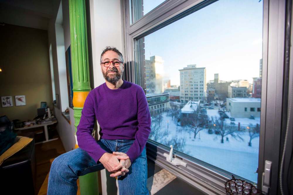 Steve Porter, who moved to the Exchange District 17 years ago, has witnessed a massive growth in population during that time. (Mikaela MacKenzie / Winnipeg Free Press)