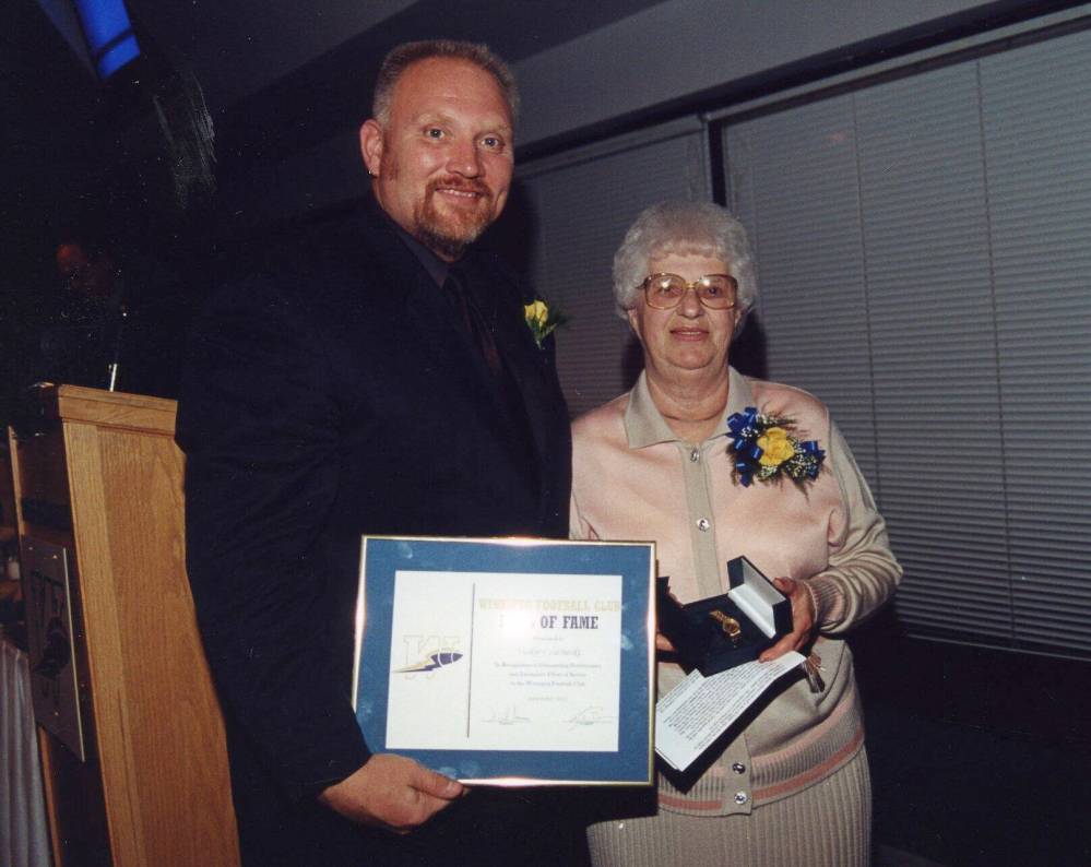 SUPPLIED Vickie Czarnecki at the 2001 Hall of Fame induction ceremony with Blue Bombers general manager Lyle Bauer.