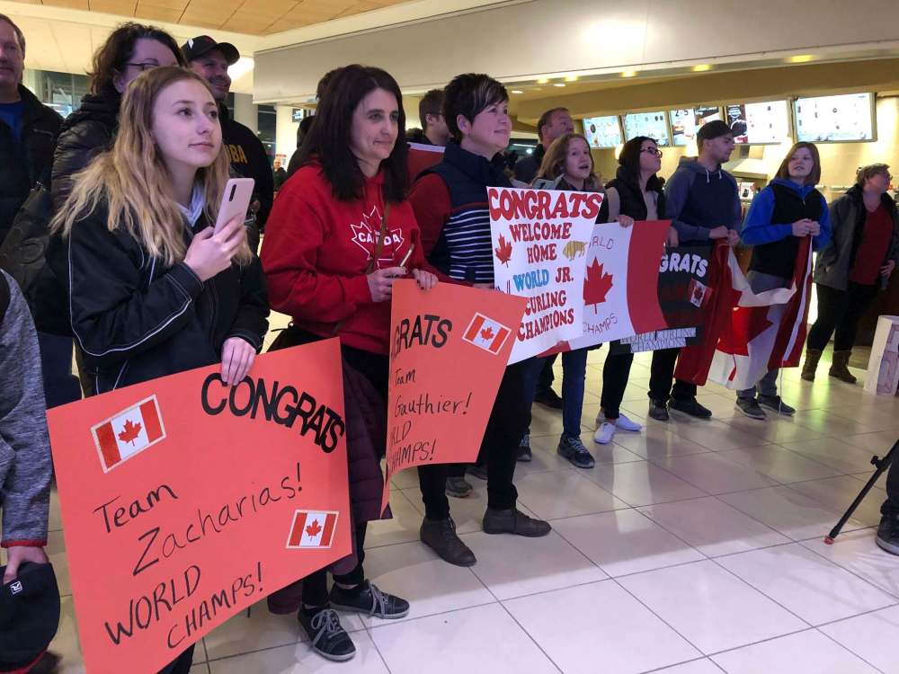 TAYLOR ALLEN / WINNIPEG FREE PRESS
Supporters await the team's arrival at James Armstrong Richardson International Airport in Winnipeg.