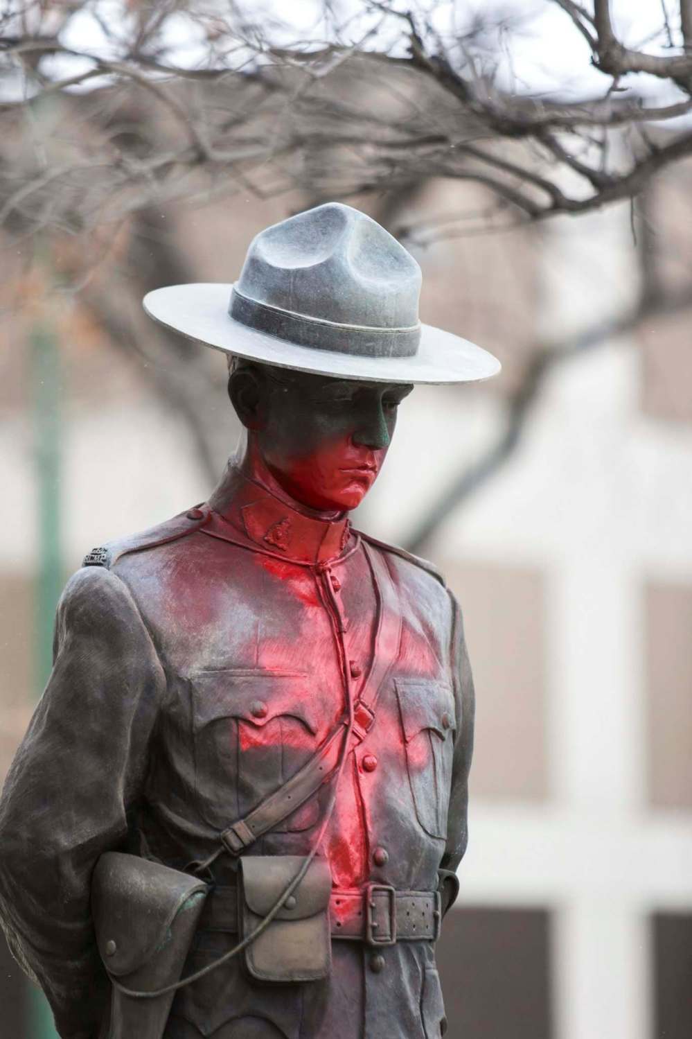 Red paint was sprayed on the statue outside RCMP D-Division headquarters on Portage Avenue. (Mikaela MacKenzie / Winnipeg Free Press)