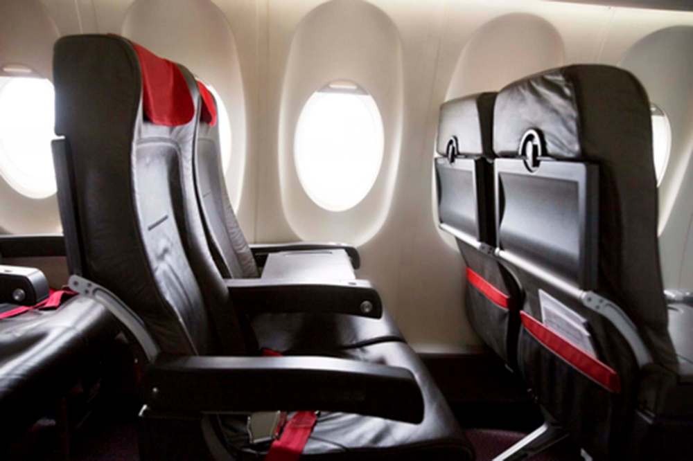 Germs on airplane seats and trays are more likely to be a problem than those in the air. (Dreamstime / TNS files)