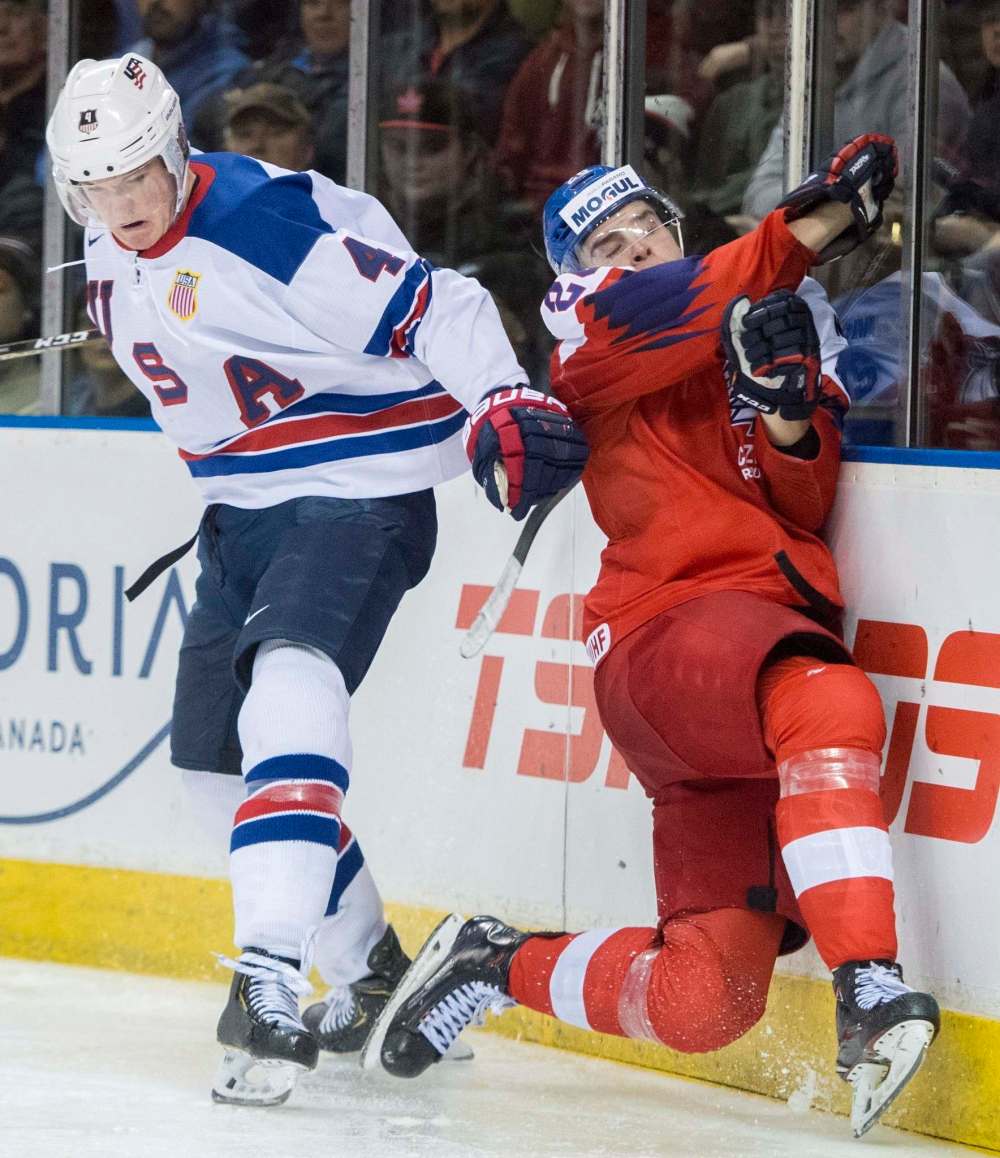 THE CANADIAN PRESS/Jonathan Hayward
Dylan Samberg, left, while playing for the United States' at the IIHF world junior hockey tournament in January.