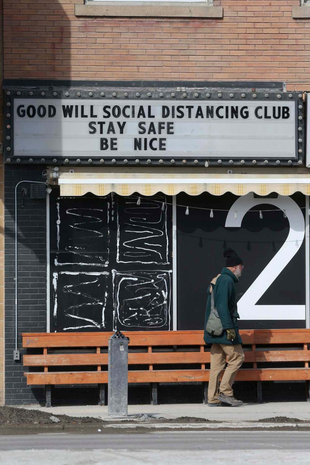 The sign at the Good Will Social Club calls for social distancing. More than $55,000 has been raised for the club in a GoFundMe campaign. Shannon Vanraes / Winnipeg Free Press files