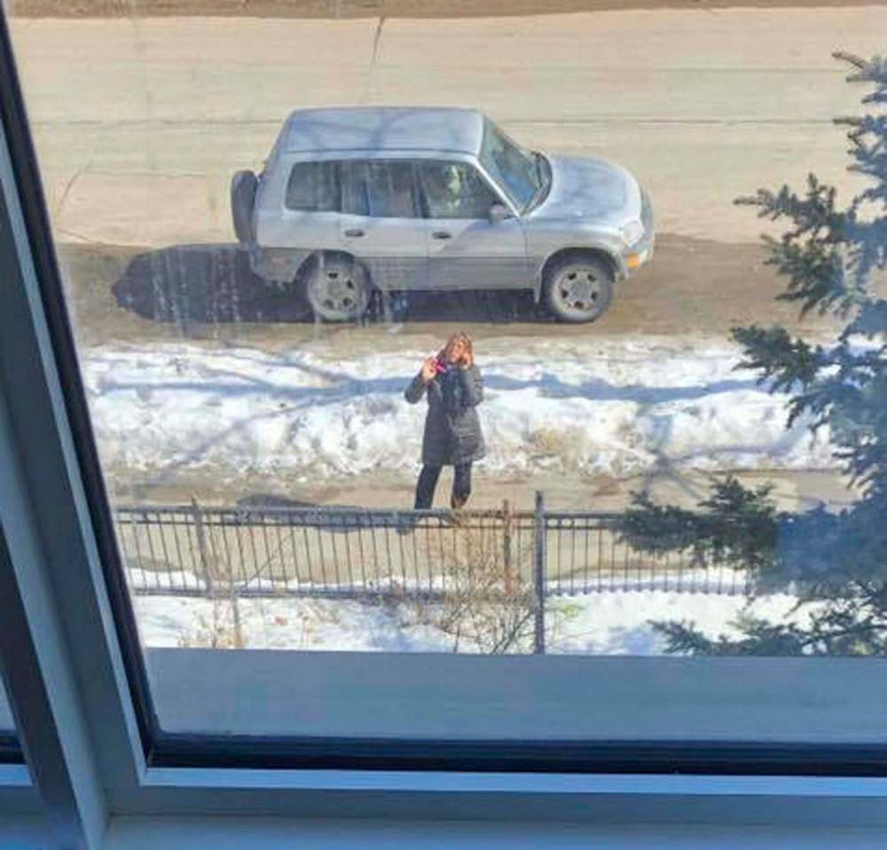 SUPPLIED
This is as close as Susan Dwilow can get to her father, David Thompson, waving from his top-floor window at the Misericordia Health Centre. Officials have shut down access to visitors in an attempt to contain the novel coronavirus.