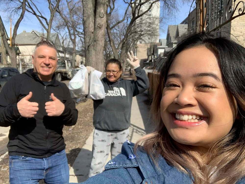 SUPPLIED
Lawrence 'Spatch' Mulhall and his god-daughter Hera Nalam deliver an emergency kit from Ma Mawi Wi Chi Itata Centre to a woman named Leeza on March 30.