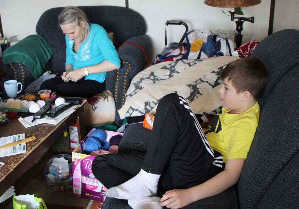 MAGGIE MACINTOSH / WINNIPEG FREE PRESS
Rita Degner and her 10-year-old grandson Cayden Degner Chartrand have been spending their days watching daytime game shows on TV and talking since they don't have internet access.