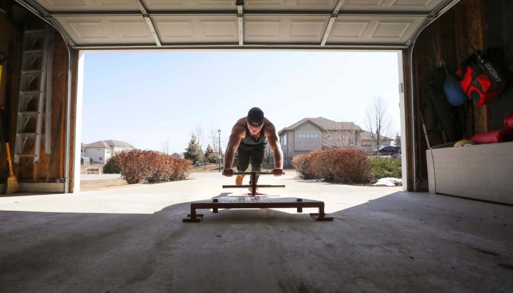 RUTH BONNEVILLE / WINNIPEG FREE PRESS
If you’re a football player during the pandemic you’d be hard-pressed to find a better setup than what Brody Williams has built at his family’s home in Oakbank.