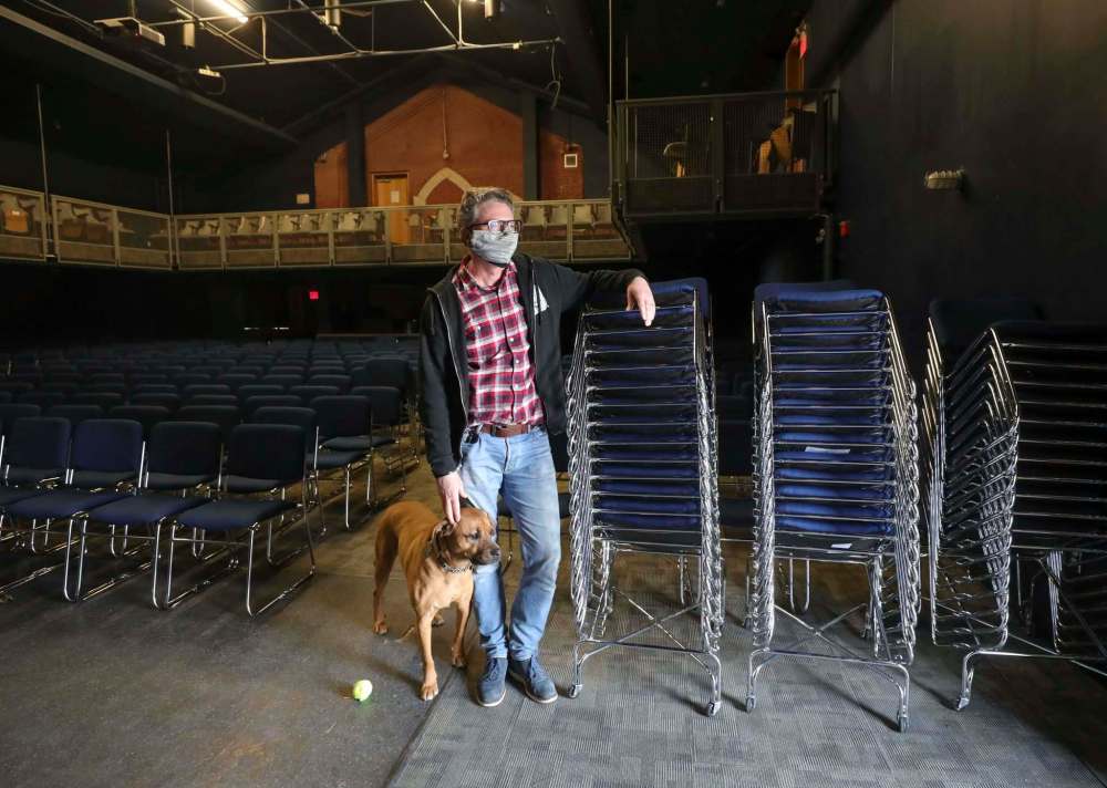 RUTH BONNEVILLE / WINNIPEG FREE PRESS
Jason Hooper, executive director of the West End Cultural Centre, with his dog Walter.