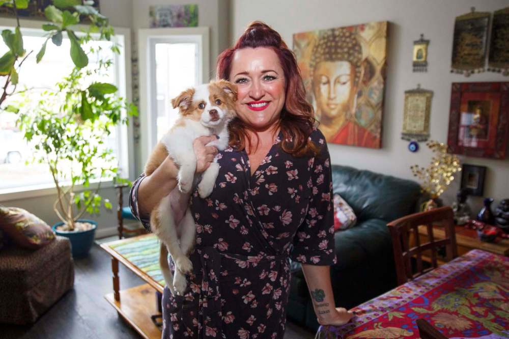 MIKE DEAL / WINNIPEG FREE PRESS
Agata Ploszanski with her new dog, Nina, an Australian shepherd mix. After her grown children returned home because of the pandemic, it seemed like the perfect time to get a new member of the family.