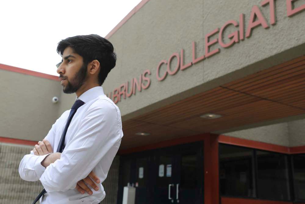 Umar Awan, a student at J. H. Bruns Collegiate, says there isn’t real closure to high school without convocation, safe grad and the subsequent photoshoots. (Ruth Bonneville / Winnipeg Free Press)