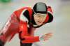 Hughes competes in the 5,000-metre speedskating event at the 2010 Vancouver Olympics. (Gerry Kahrmann / Postmedia News files)