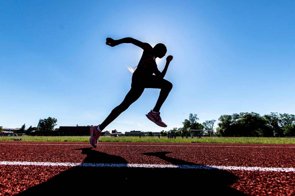 Mike Sudoma / Winnipeg Free Press
Kelvin track star, Rofiat Agboola practices sprinting at Victor Mager School in St Vital Friday afternoon
June 26, 2020