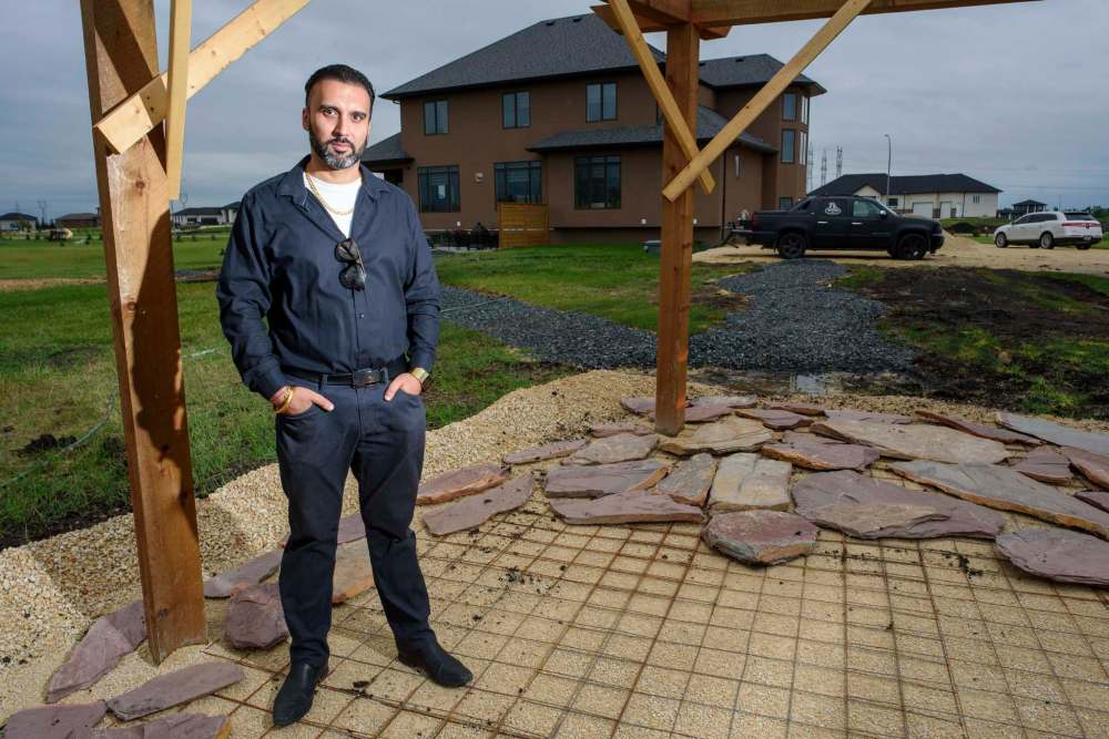 Ricky Brar recently built his home in West St. Paul and has found it difficult to find landscapers. (Jesse Boily / Winnipeg Free Press)