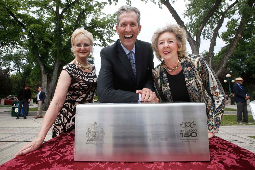 JOHN WOODS / WINNIPEG FREE PRESS
Speaker of the House Myrna Driedger, Premier Brian Pallister and Lt. Gov. Janice Filmon dedicated the Manitoba Legislarure on it’s 100th birthday and unveiled a Manitoba 150 time capsule behind the legislature Wednesday.