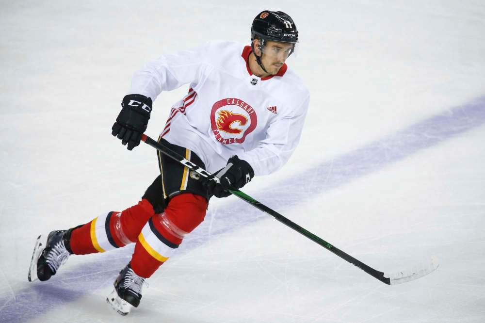 Jeff McIntosh / The Canadian Press files
Calgary Flames’ Mikael Backlund figures his squad is superior to Winnipeg’s club.