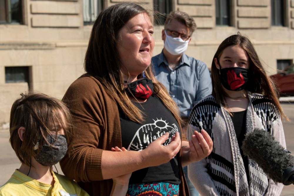 JESSE BOILY / WINNIPEG FREE PRESS
Kisa MacIsaac, an early childhood educator speaks to media outside of the Legislative building on Tuesday.